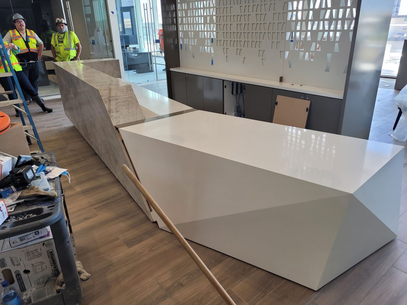 Mitered stone reception desk fabricated by Cangelosi Company