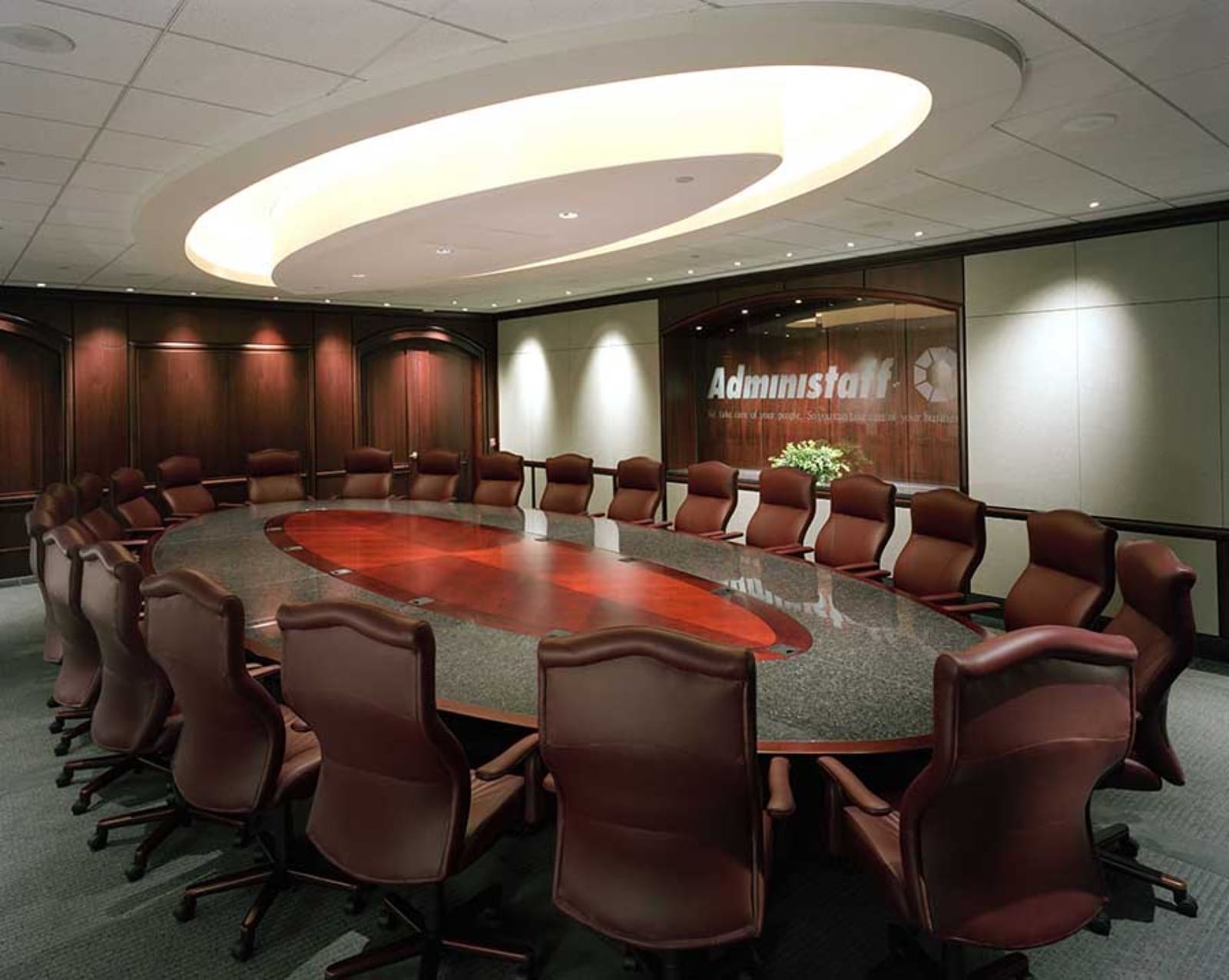 Custom granite boardroom table fabricated by Cangelosi Company