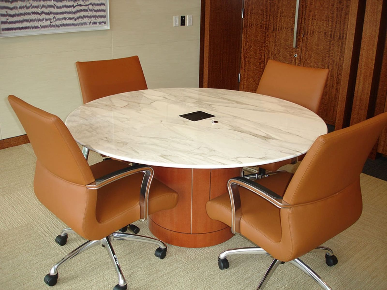 Calacatta marble conference table fabricated by Cangelosi Company