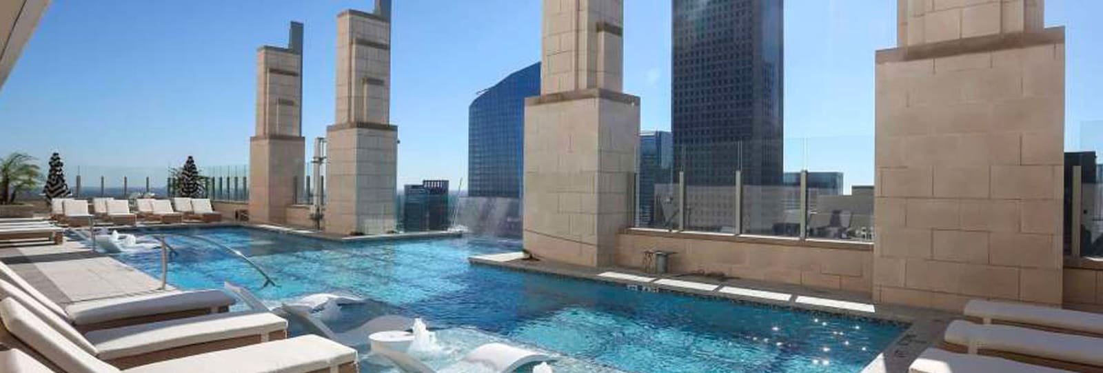 Pool deck stone pavers at a multi-family community by Cangelosi Company