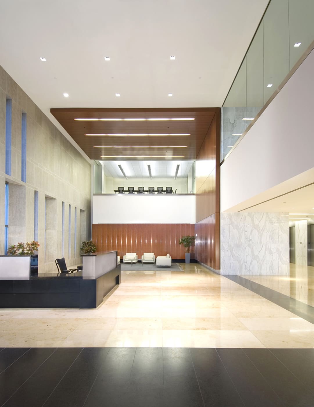 Completed stone lobby installation by Cangelosi Company in a Houston office building