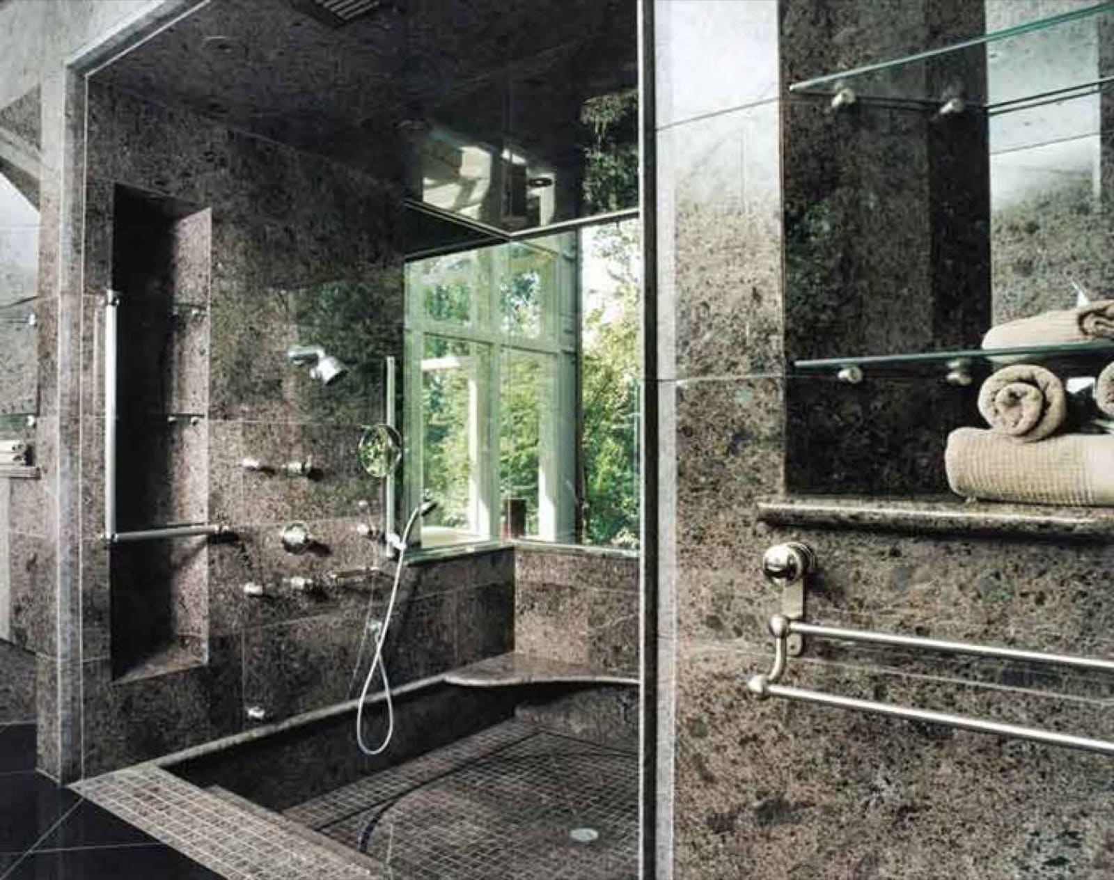 Custom marble slab shower fabricated by Cangelosi Company