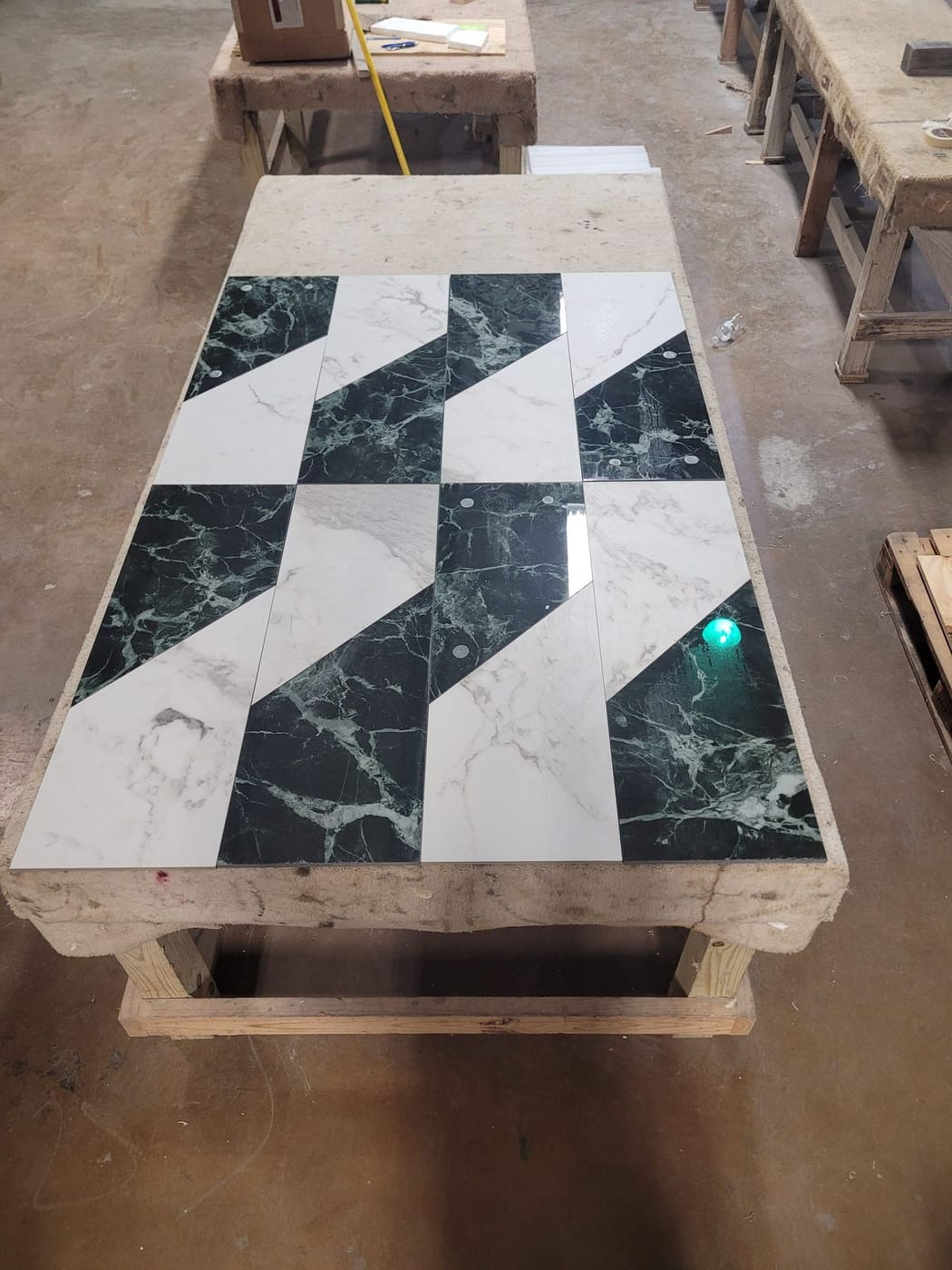 Waterjet-cut chevron pattern stone panel by Cangelosi Company