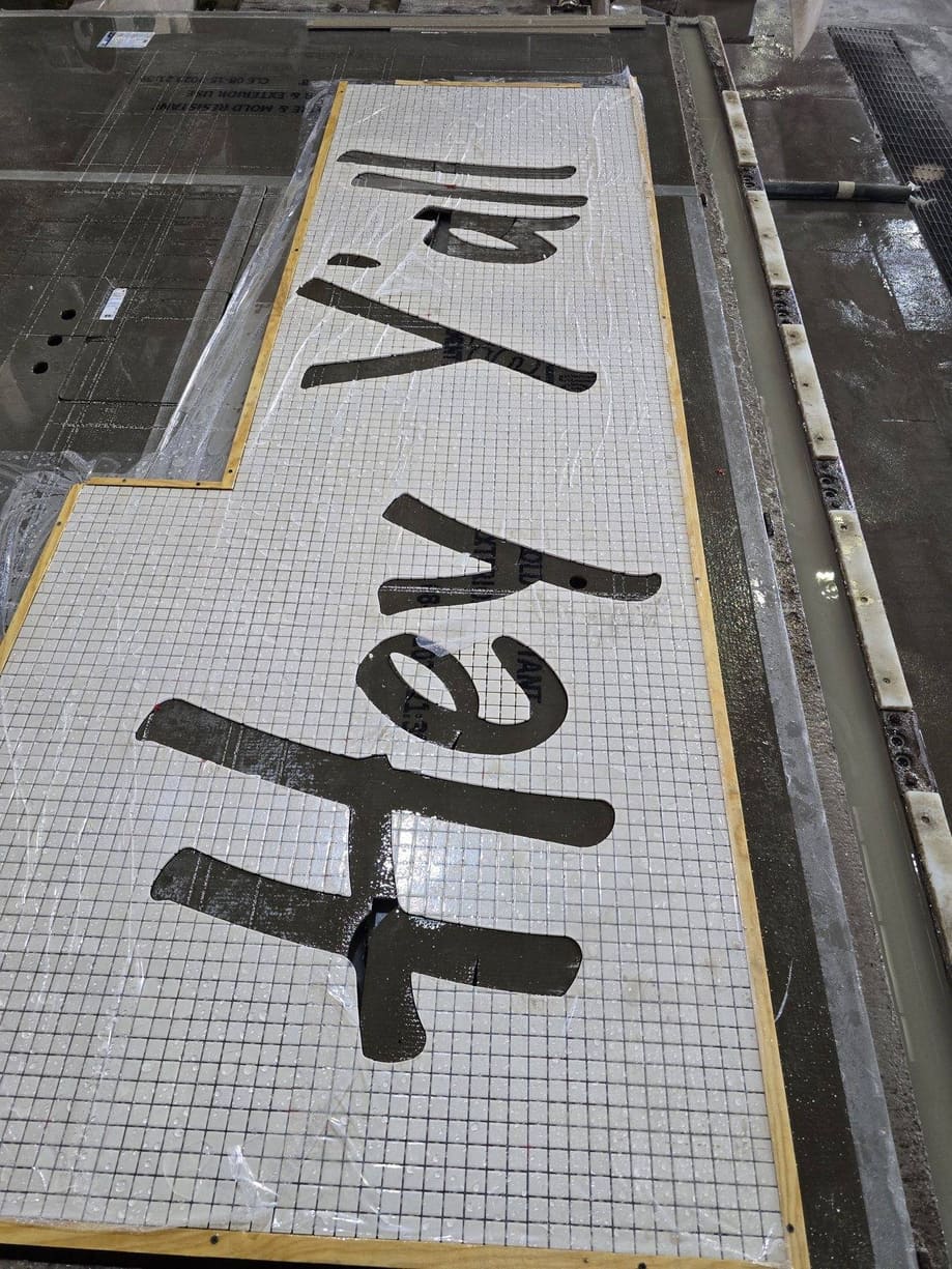 Waterjet-cut custom stone lettering fabricated by Cangelosi Company